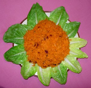 Incan Carrot Salad displayed with romaine leaves